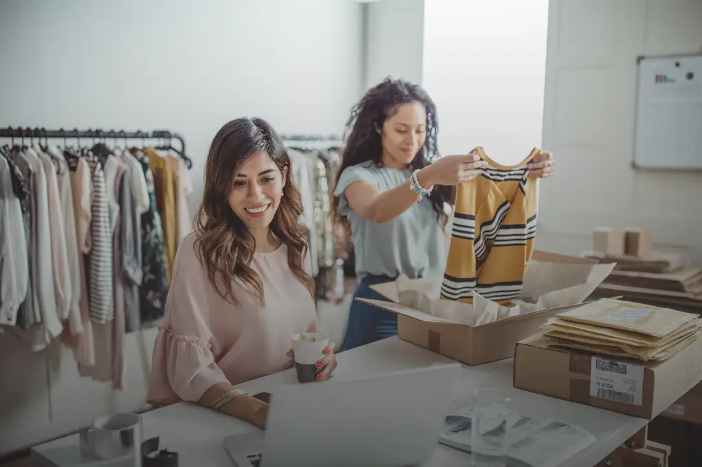 Two women working in clothing store | Why WordPress is Ideal for Small Businesses in South Africa